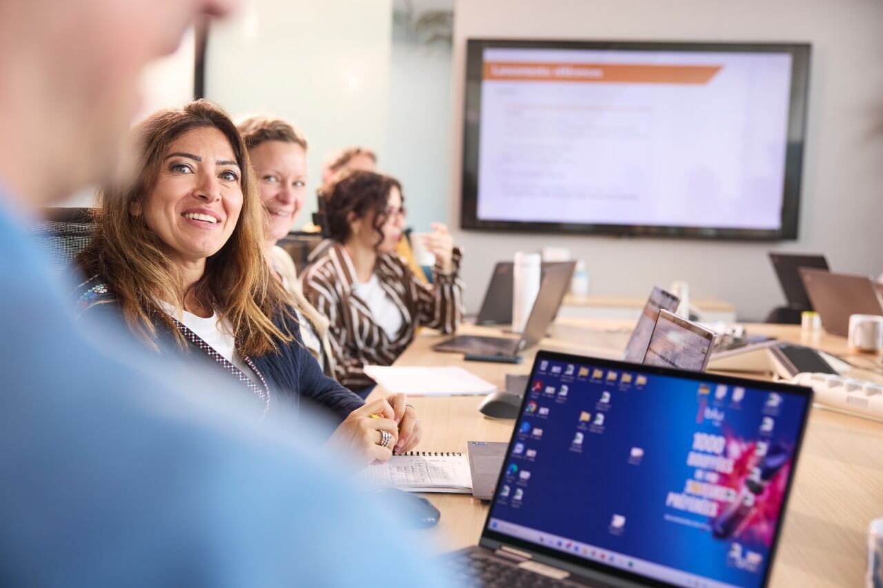 Colleagues collaborating during a workplace discussion.